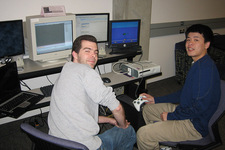 Peter Yiap (left) and Robert Stone, seniors in Computer And Software Systems at UW Bothell, work on the XBOX for their final project for CSS 450 Computer Graphics, taught by Kelvin Sung last quarter.