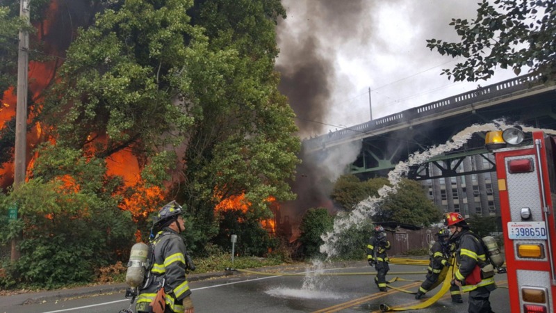 Fire rages at vacant Seattle building, smoke seen for miles