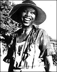 Black and white photograph of a smiling Zora,  as posted on the home page of the aforementioned website.