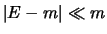 $\vert E-m\vert \ll m$