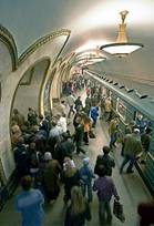 A crowd bustles through the Metro