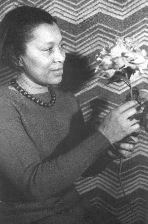 Zora Neala Hurston with flowers
